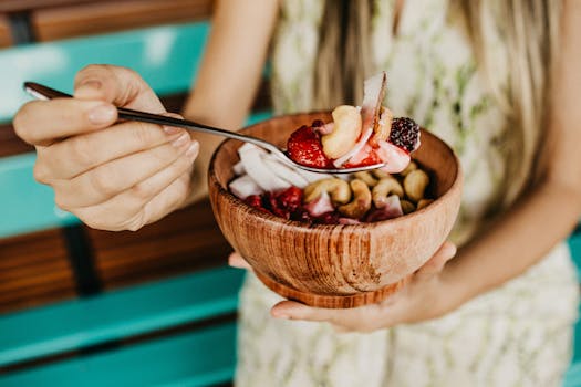 colorful smoothie bowl with fruits and nuts