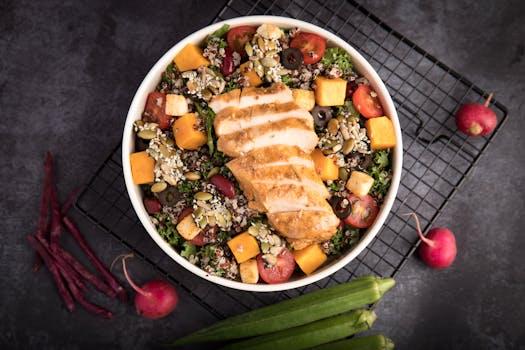 Healthy balanced meal with chicken, quinoa, and vegetables